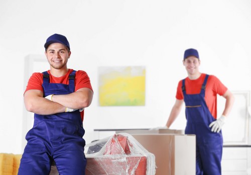 Professional removal team handling furniture