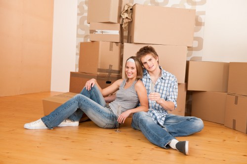 Professional movers handling furniture